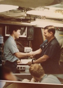 The legendary Captain Douglas S. Wright awarding  me my Dolphins while on deployment (1983).